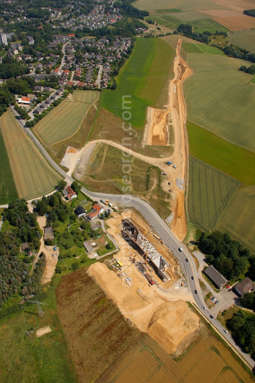 Heiligenhaus from the bird's eye view: Construction site at Ratinger Strasse in Heiligenhaus in North Rhine-Westphalia. A new section of the motorway A44 is getting build up here as a connection between the Autobahnkreuz Ratingen-Ost and Heiligenhaus-Heiligenscheidt