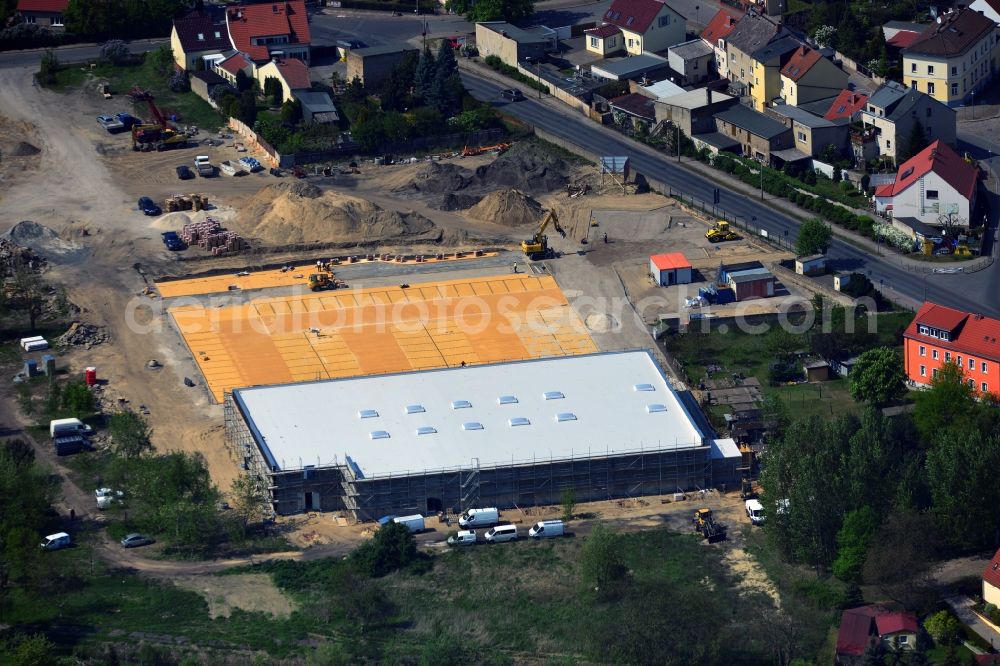 Schwielowsee-Caputh from above - In the district Caputh the community Schwielow a new REWE market is currently being built in the Friedrich-Ebert-Strasse. The supermarket will be the first building block of the new flower district