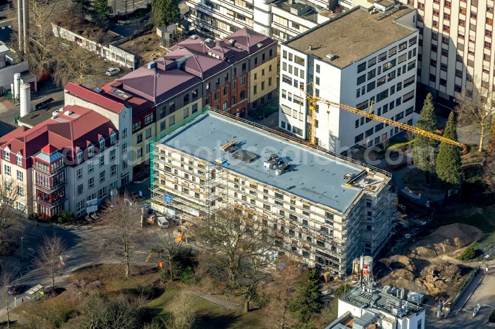 Aerial image Mülheim an der Ruhr - Construction site for a new extension to the hospital grounds Evangelisches Krankenhaus Muelheim on Schulstrasse in Muelheim on the Ruhr in the state North Rhine-Westphalia, Germany