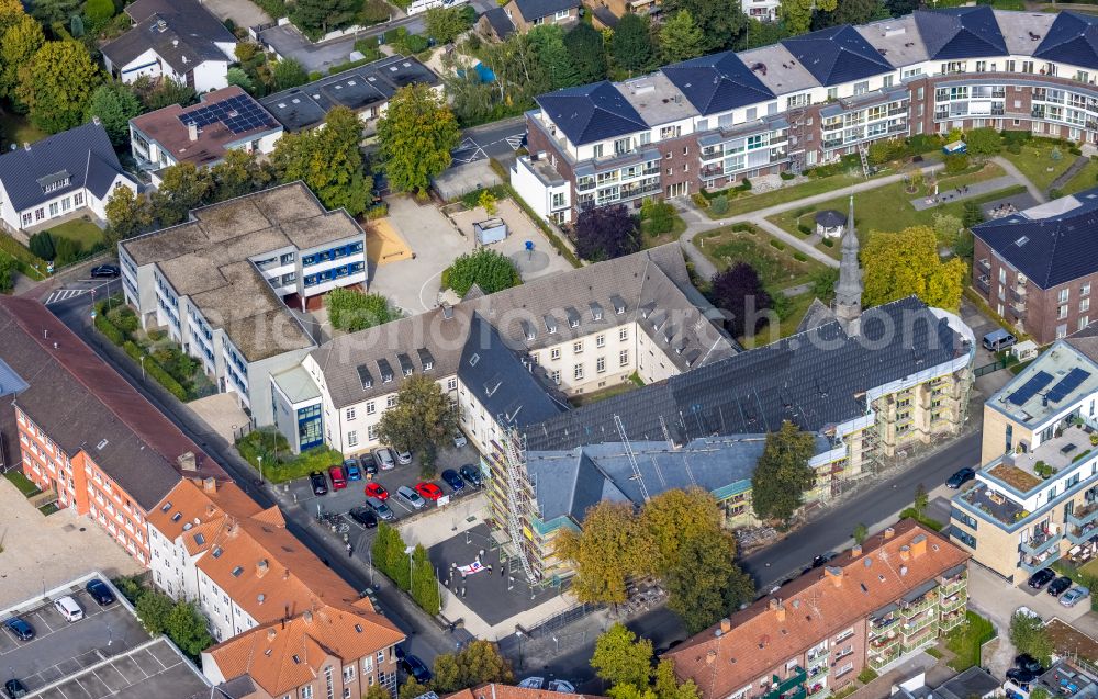 Hamm from above - Construction site for renovation and reconstruction work on the church building St. Agnes Kirche on Bruederstrasse - Franziskanerstrasse in the district Heessen in Hamm at Ruhrgebiet in the state North Rhine-Westphalia, Germany