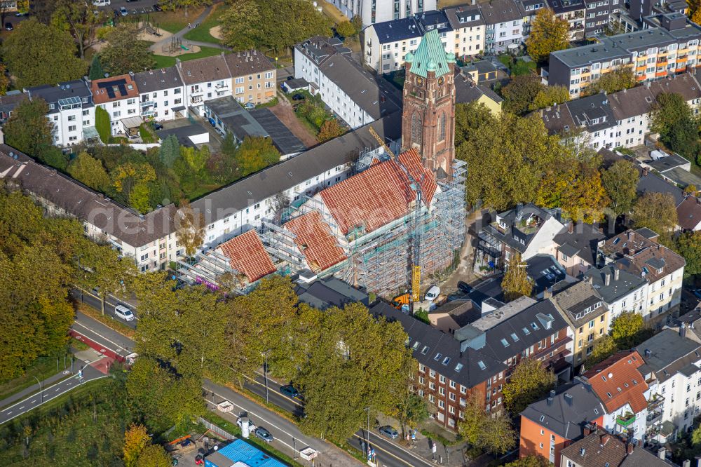 Aerial photograph Bochum - Construction site for renovation and reconstruction work on the church building Antonius-Quartier on street Arnoldstrasse - Antoniusstrasse - Bessemerstasse in the district Innenstadt in Bochum at Ruhrgebiet in the state North Rhine-Westphalia, Germany