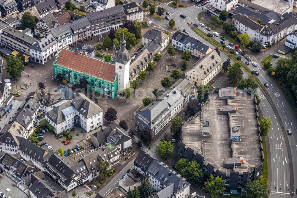 Aerial photograph Meschede - Construction site for renovation and reconstruction work on the church building Kath. Pfarrkirche St. Walburga in Meschede in the state North Rhine-Westphalia, Germany