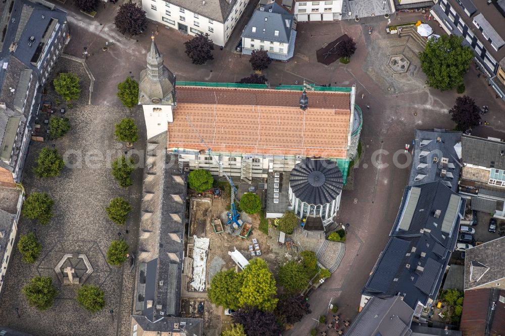 Aerial image Meschede - Construction site for renovation and reconstruction work on the church building Kath. Pfarrkirche St. Walburga in Meschede in the state North Rhine-Westphalia, Germany