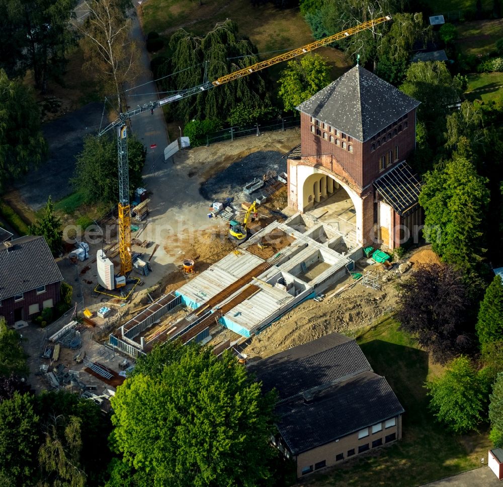 Aerial image Werne - Construction site for renovation and reconstruction work on the church building kath. Kirche St. Konrad Stockumer Strasse in Werne in the state North Rhine-Westphalia, Germany