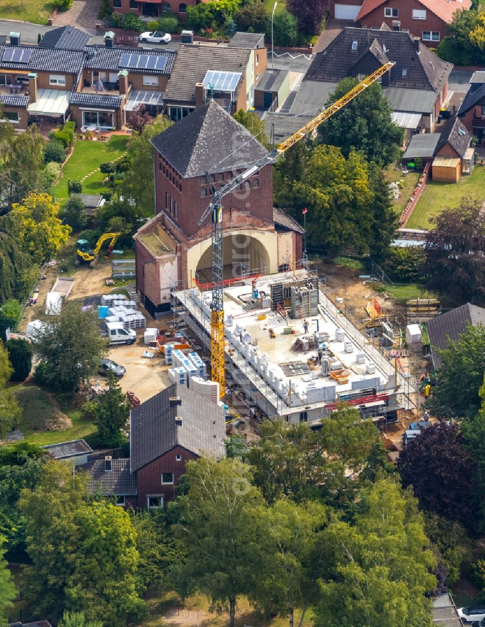 Aerial photograph Werne - Construction site for renovation and reconstruction work on the church building kath. Kirche St. Konrad Stockumer Strasse in Werne in the state North Rhine-Westphalia, Germany