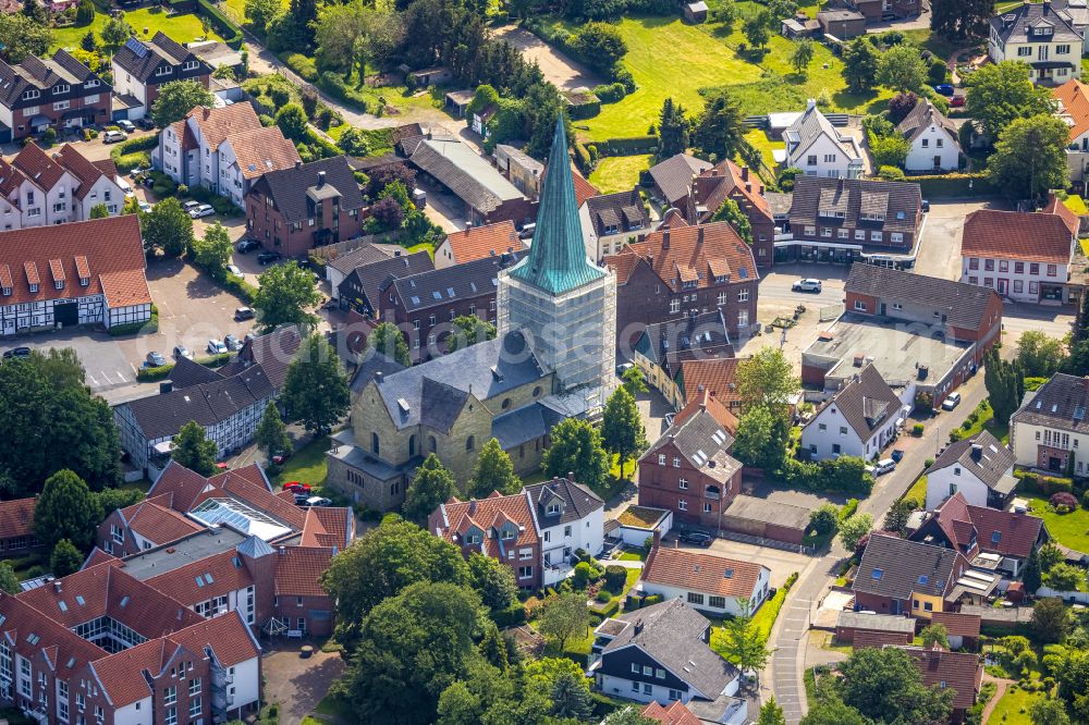 Aerial photograph Rhynern - Construction site for renovation and reconstruction work on the church building St. Regina on Sankt-Reginen-Platz in Rhynern in the state North Rhine-Westphalia, Germany
