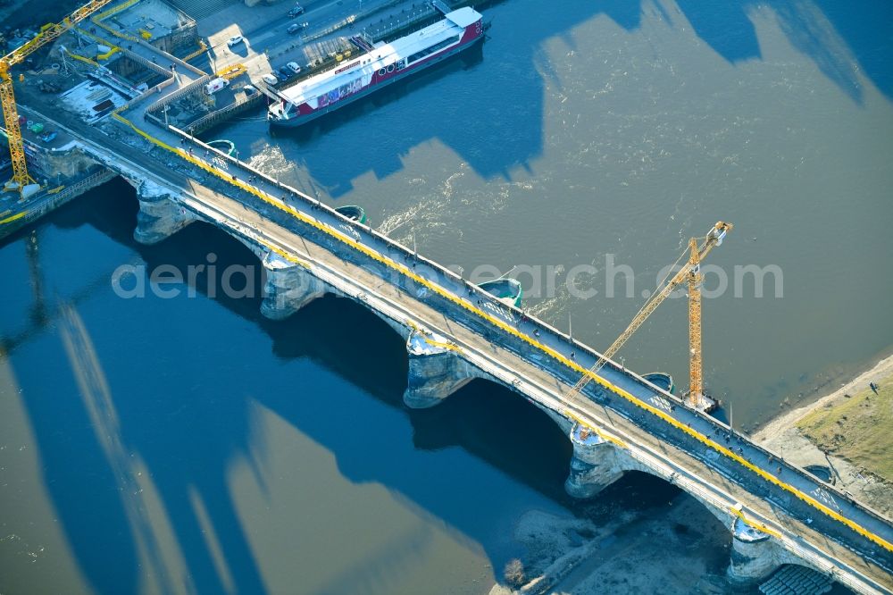 Dresden from above - Construction to renovation work on the road bridge structure Augustusbruecke about the shore of elbe river in Dresden in the state Saxony, Germany