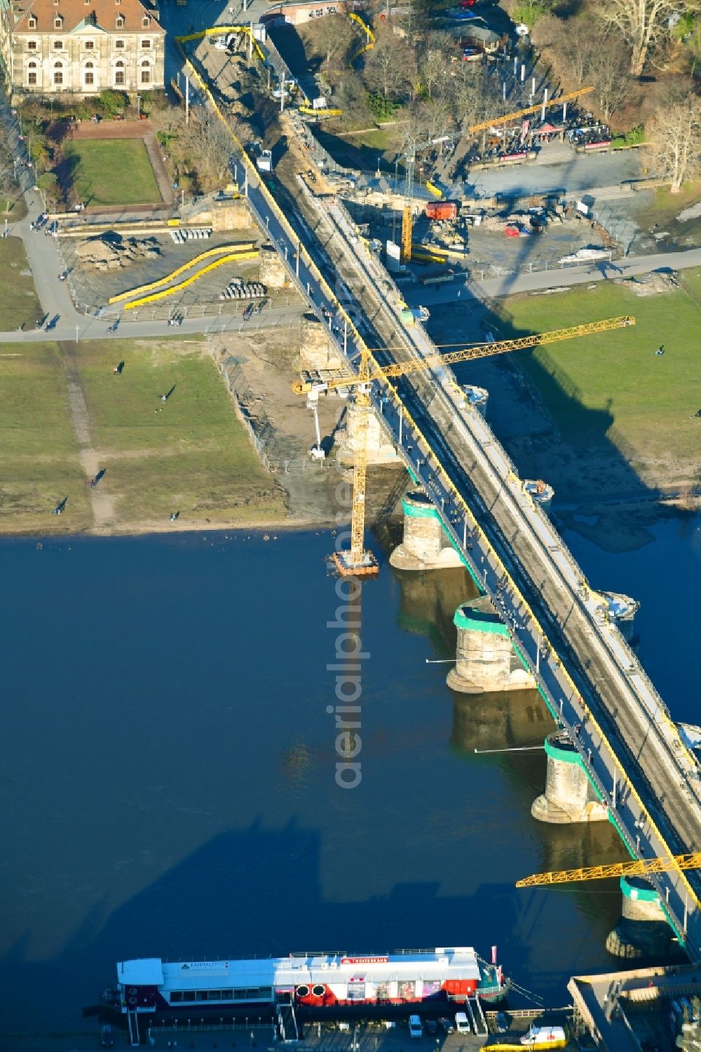 Aerial photograph Dresden - Construction to renovation work on the road bridge structure Augustusbruecke about the shore of elbe river in Dresden in the state Saxony, Germany