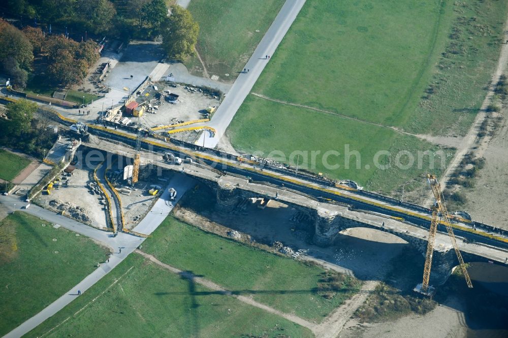 Aerial image Dresden - Construction to renovation work on the road bridge structure Augustusbruecke about the shore of elbe river in Dresden in the state Saxony, Germany