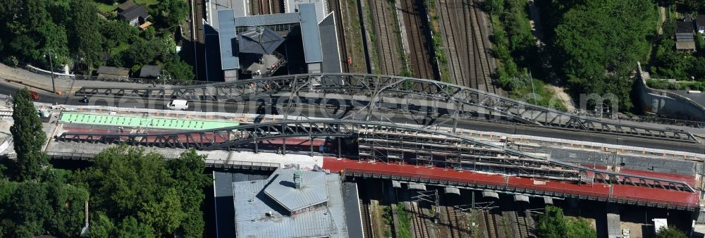 Aerial image Berlin - Construction to renovation work on the road bridge structure Train Station Bornholmer Strasse in Berlin