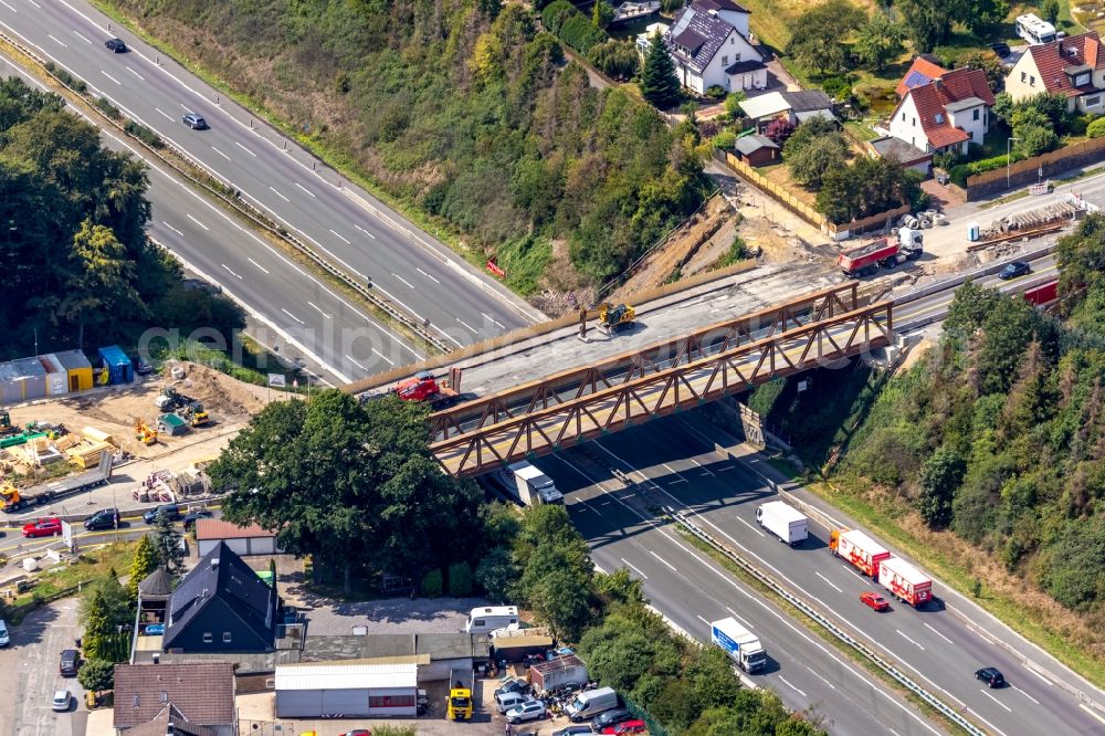 Gevelsberg from the bird's eye view: Construction to renovation work on the road bridge structure Eichholzstrasse in the district Heck in Gevelsberg in the state North Rhine-Westphalia, Germany