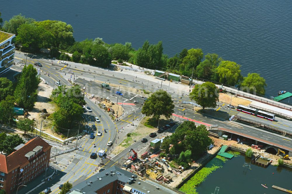 Hamburg from the bird's eye view: Construction site for renovation work on the road bridge structure Hohenfelder Bruecken on the Alsterufer at Hartwicusstrasse - Schwanenwik - Armgartstrasse in the district of Uhlenhorst in Hamburg, Germany