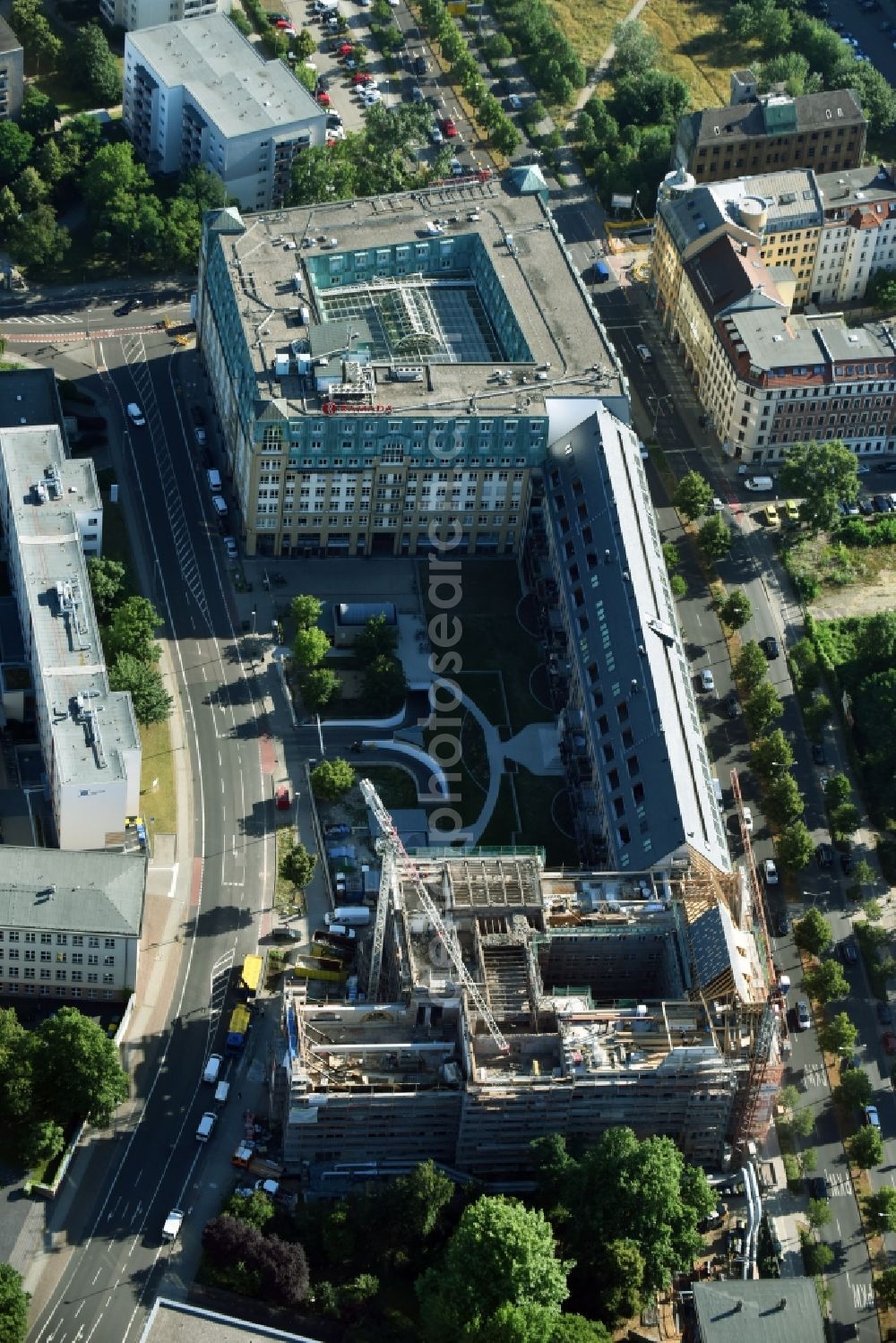 Aerial photograph Leipzig - Construction to renovation work and for reconstruction of the Bugra exhibition house building complex of Gutenberggalerie and the Ramada on Gutenbergplatz in Graphic Quarter in Leipzig in Saxony