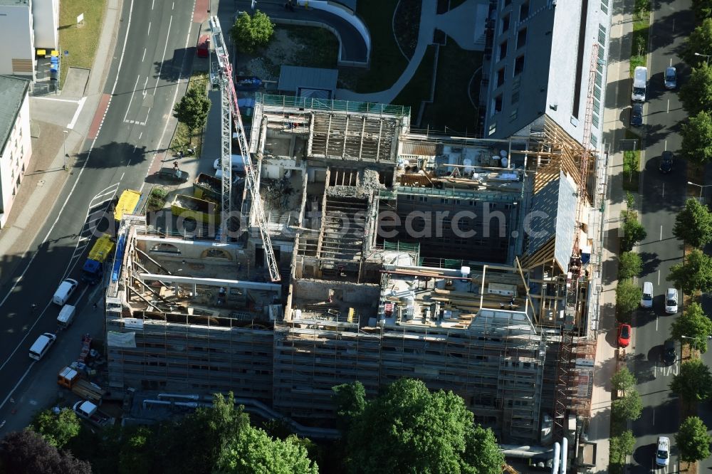 Leipzig from the bird's eye view: Construction to renovation work and for reconstruction of the Bugra exhibition house building complex of Gutenberggalerie and the Ramada on Gutenbergplatz in Graphic Quarter in Leipzig in Saxony