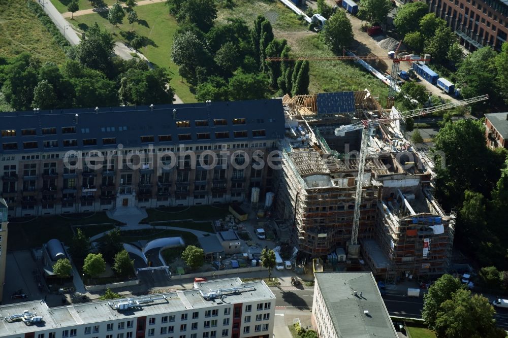 Leipzig from the bird's eye view: Construction to renovation work and for reconstruction of the Bugra exhibition house building complex of Gutenberggalerie and the Ramada on Gutenbergplatz in Graphic Quarter in Leipzig in Saxony