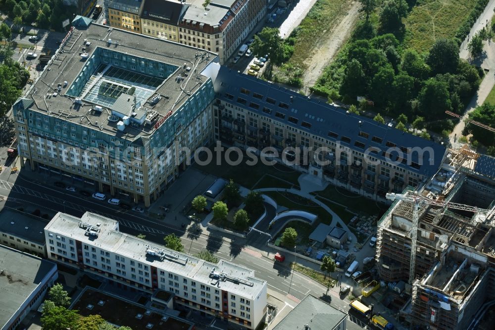 Leipzig from the bird's eye view: Construction to renovation work and for reconstruction of the Bugra exhibition house building complex of Gutenberggalerie and the Ramada on Gutenbergplatz in Graphic Quarter in Leipzig in Saxony