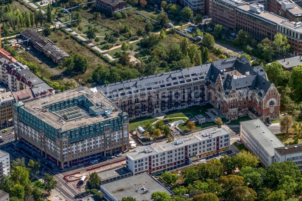 Leipzig from the bird's eye view: Construction to renovation work and for reconstruction of the Bugra exhibition house building complex of Gutenberggalerie and the Ramada on Gutenbergplatz in Graphic Quarter in Leipzig in Saxony