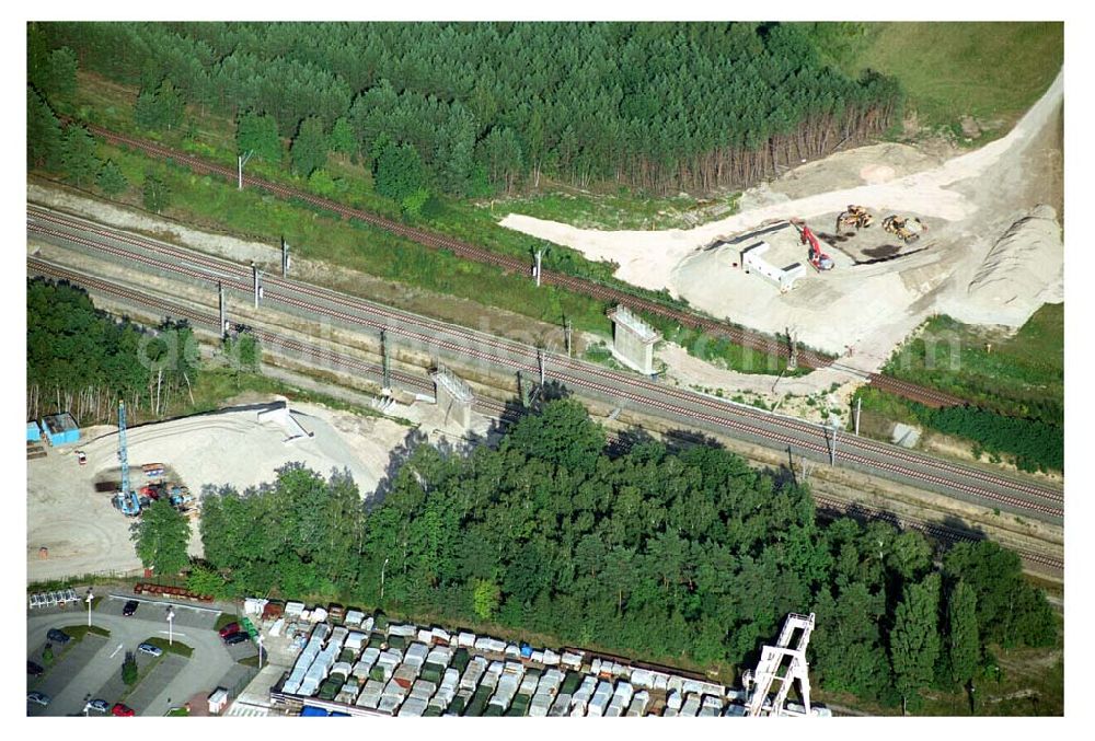 Ludwigsfelde/ Genshagener Heide (Brandenburg) from the bird's eye view: Blick auf den im Bau befindlichen Schienenübergang am Kreuzungsbauwerk Berliner Außenring (BAR) und der Anhalter Bahn