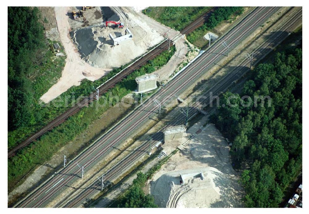 Ludwigsfelde/ Genshagener Heide (Brandenburg) from the bird's eye view: Blick auf den im Bau befindlichen Schienenübergang am Kreuzungsbauwerk Berliner Außenring (BAR) und der Anhalter Bahn