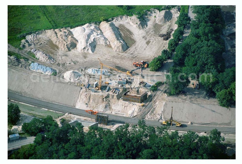 Aerial photograph Ludwigsfelde/ Genshagener Heide (Brandenburg) - Blick auf den im Bau befindlichen Schienenübergang bei der Kramer-Kurve zwischen Anhalter Bahn und Berliner Außenring (BAR)