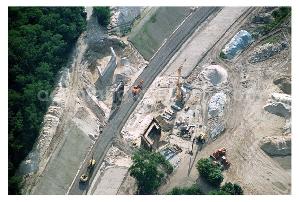 Aerial photograph Ludwigsfelde/ Genshagener Heide (Brandenburg) - Blick auf den im Bau befindlichen Schienenübergang bei der Kramer-Kurve zwischen Anhalter Bahn und Berliner Außenring (BAR)