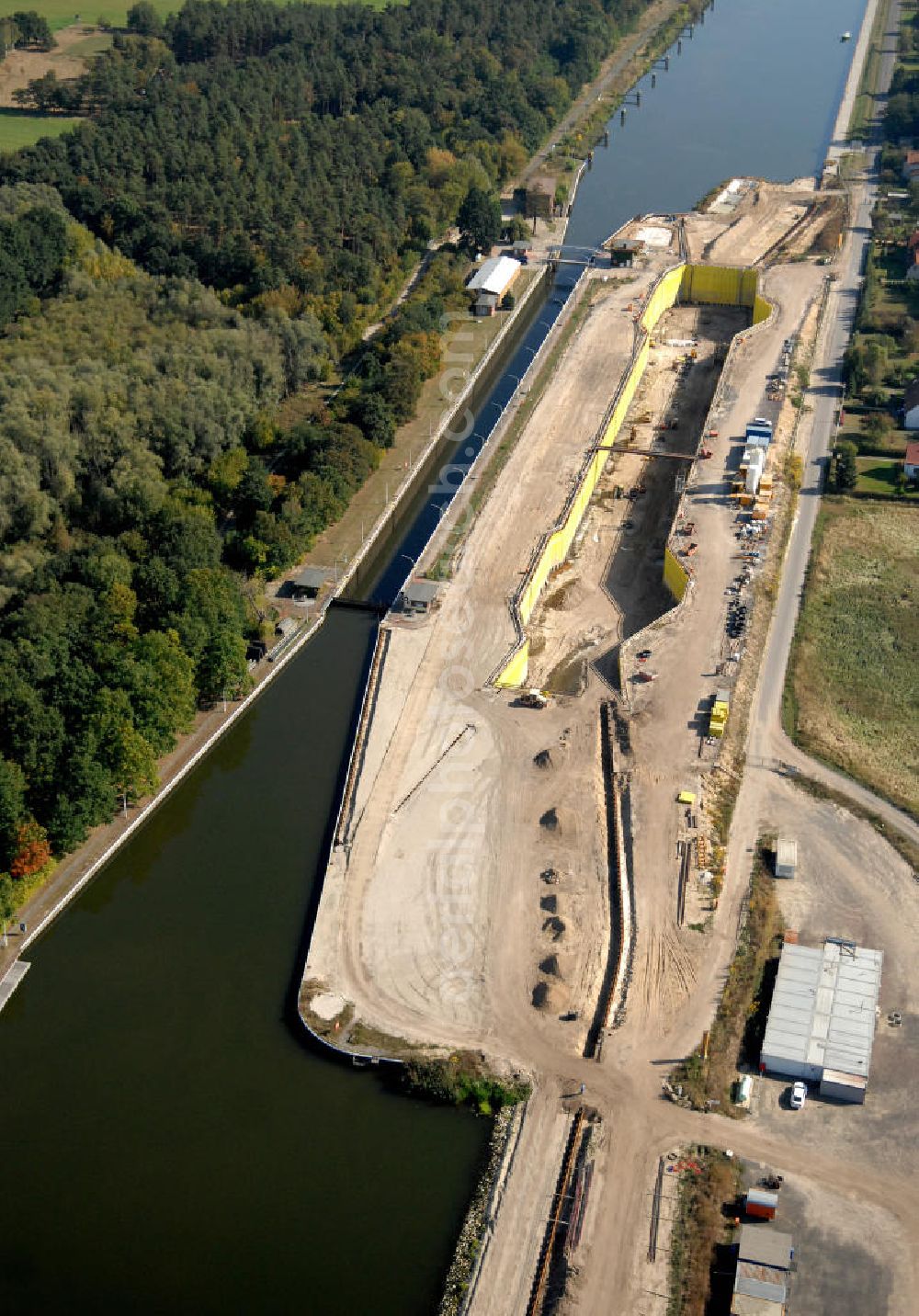 Aerial photograph Wusterwitz - Blick auf die Baustelle vom Neubau der 2. Schleuse Wusterwitz. Ein Projekt des WSV: Wasserstraßen-Neubauamt Magdeburg, 39106 Magdeburg, Tel. +49(0)391 535-0, email: wna-magdeburg@wsv.bund.de