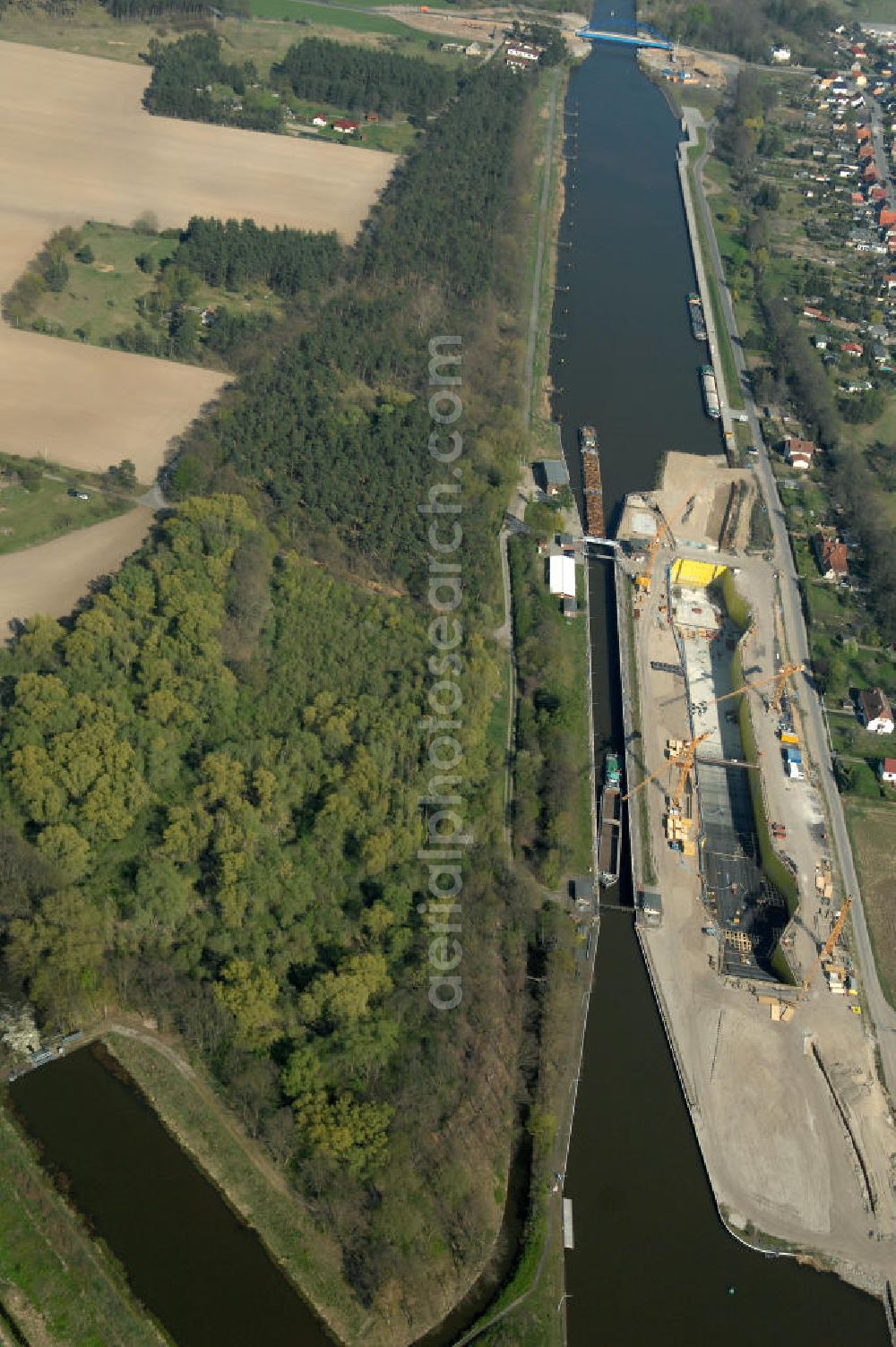 Aerial photograph Wusterwitz - Blick auf die Erweiterungsbaustelle der Schleuse Wusterwitz. Ein Projekt des WSV: Wasserstraßen-Neubauamt Magdeburg, View of the construction site of the expansion lock Wusterwitz.