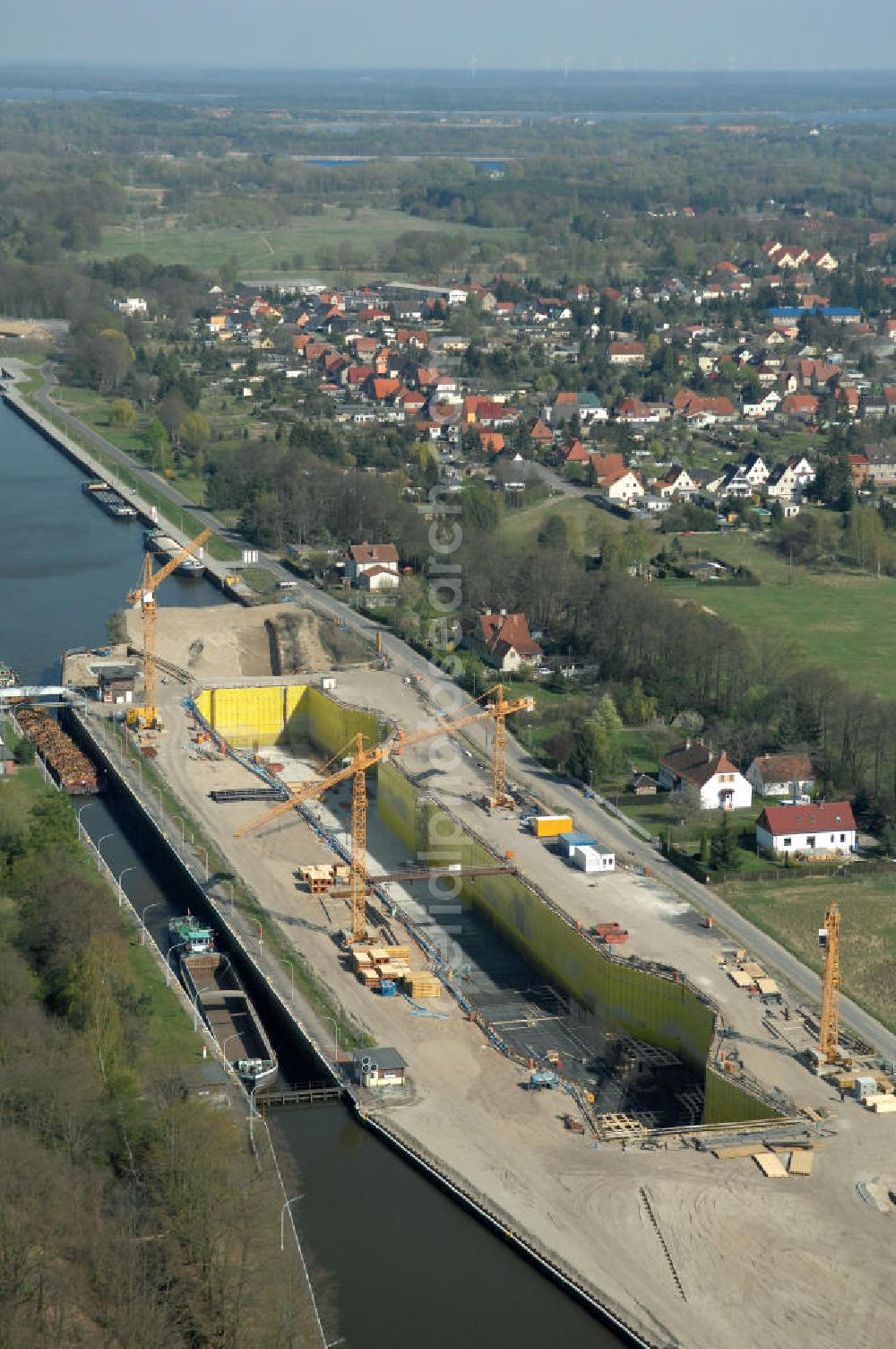 Aerial photograph Wusterwitz - Blick auf die Erweiterungsbaustelle der Schleuse Wusterwitz. Ein Projekt des WSV: Wasserstraßen-Neubauamt Magdeburg, View of the construction site of the expansion lock Wusterwitz.