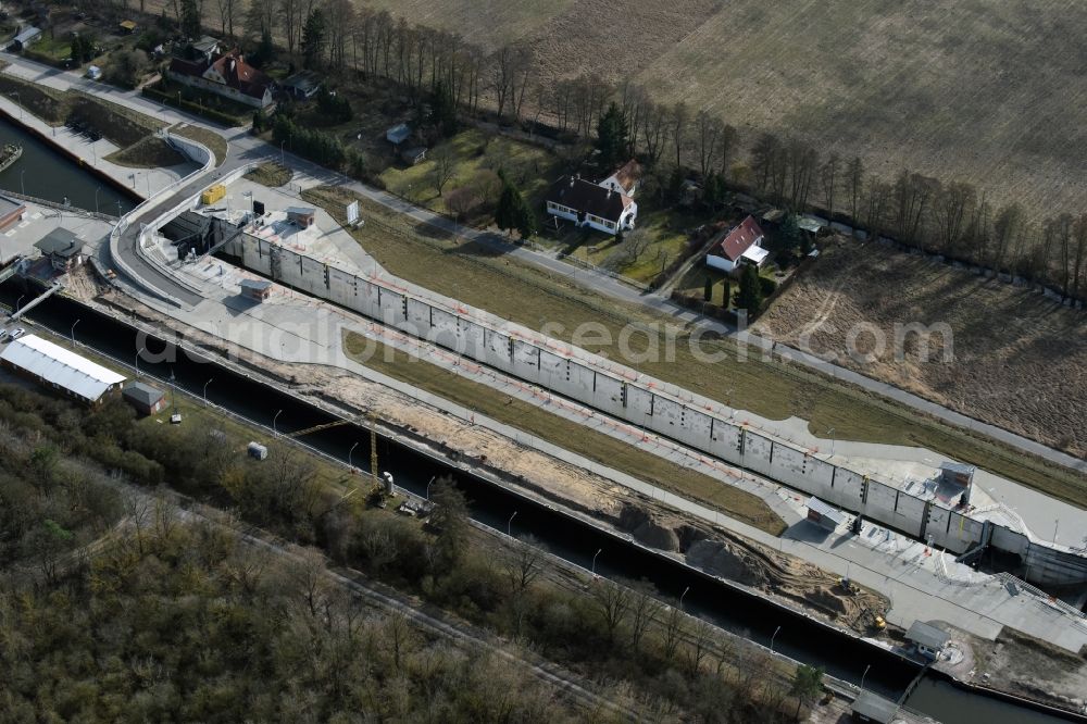 Elbe-Parey from the bird's eye view: Construction site at the Zerben sluice, bridge and the weir at the riverside of the Elbe-Havel-Canel in the state Saxony-Anhalt