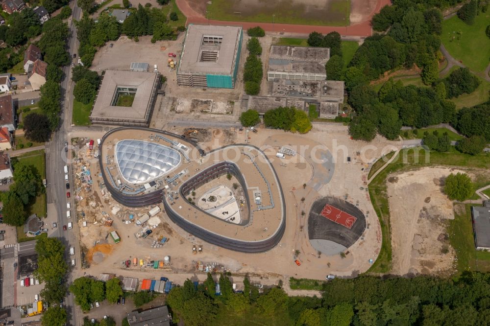 Bochum from the bird's eye view: Construction site of School building of the Neues Gymnasium Bochum on Querenburger Strasse in Bochum in the state North Rhine-Westphalia