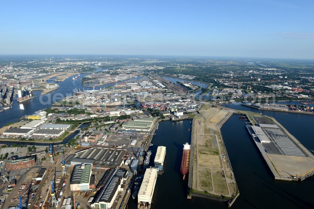 Hamburg from above - View of the construction site of the city development area Baakenhafen on the Elbe in Hamburg. Since the resolution of the Senate in 1998, the harbor and the surrounding headlands are formally part of the project HafenCity, where the port areas released south of the city center of Hamburg from its original use and to be converted to retail, commercial, residential and leisure-related areas