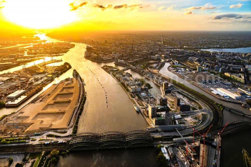 Hamburg from the bird's eye view: Construction site of the city development area Baakenhafen on the Elbe in Hamburg. Since the resolution of the Senate in 1998, the harbor and the surrounding headlands are formally part of the project HafenCity, where the port areas released south of the city center of Hamburg from its original use and to be converted to retail, commercial, residential and leisure-related areas