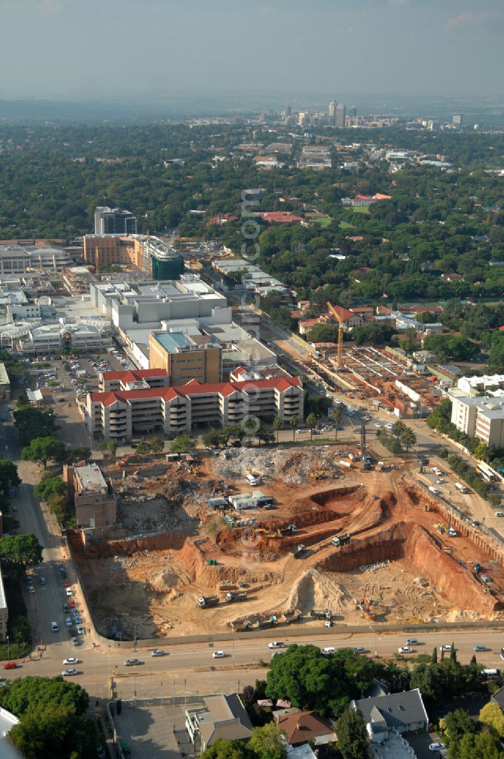 Aerial image JOHANNESBURG - Construction site in the district of Rosebank on the corner of Oxford Road / Baker Straat in Johannesburg, South Africa. Rosebank is well known for its large shopping center, the Mall of Rosebank