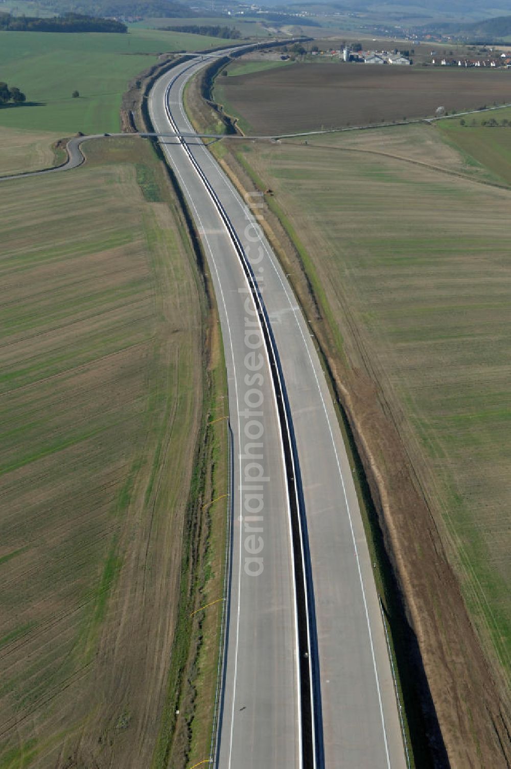 Aerial photograph Neukirchen - Blick auf die Baustelle zweier Strassenbrücken, vorn zwischen Hötzelsroda und Neukirchen und hinten südlich von Neukirchen, welche über die A4 führen. Der Neubau ist Teil des Projekt Nordverlegung / Umfahrung Hörselberge der Autobahn E40 / A4 in Thüringen bei Eisenach. Durchgeführt werden die im Zuge dieses Projektes notwendigen Arbeiten unter an derem von den Mitarbeitern der Niederlassung Weimar der EUROVIA Verkehrsbau Union sowie der Niederlassungen Abbruch und Erdbau, Betonstraßenbau, Ingenieurbau und TECO Schallschutz der EUROVIA Beton sowie der DEGES.