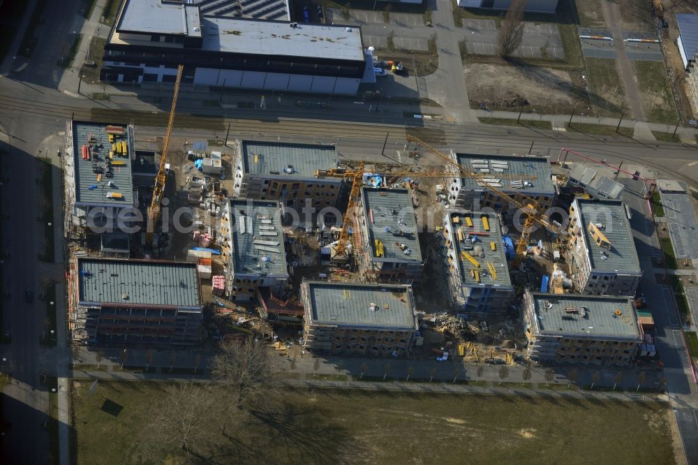 Aerial image Berlin-Adlershof - Zueblin AG is currently building on behalf of the Students Schlachtensee eG in Science Campus Adlershof at the Karl-Ziegler-Strasse student village. The 380 residential units for students in 10 houses will be completed in summer 2014. The special feature of the student village are the common areas like the living room and kitchen, which group the individual floors of the residential landscape