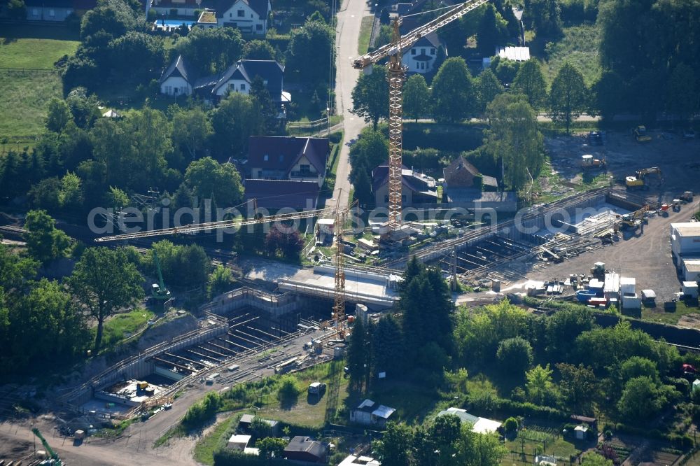 Aerial image Walddrehna - Construction site with tunnel guide for the route of Walddrehna Lindenstrasse in Walddrehna in the state Brandenburg, Germany