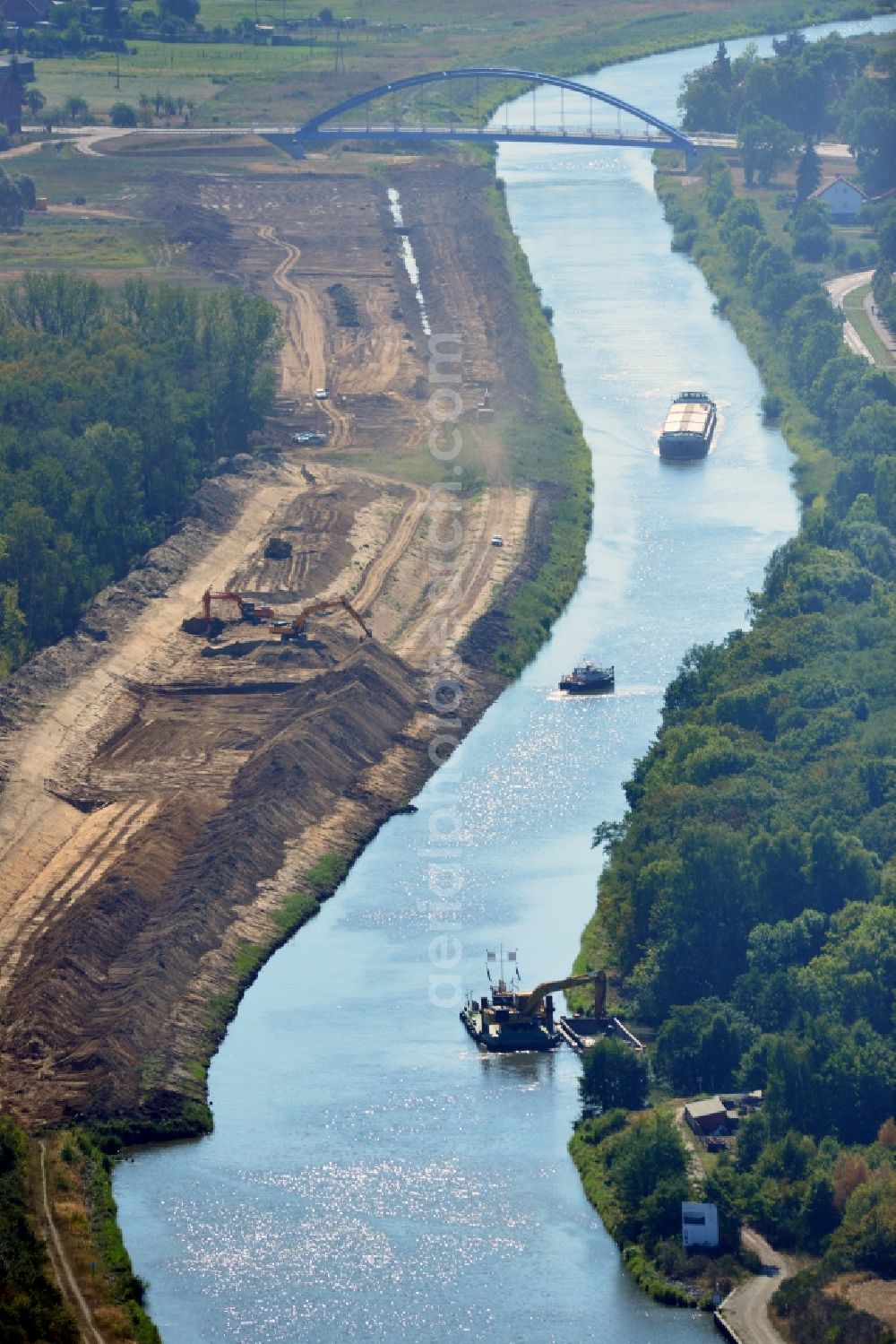 Güsen from the bird's eye view: Construction site at the riverside of the Elbe-Havel-Canel in Guesen in the state Saxony-Anhalt