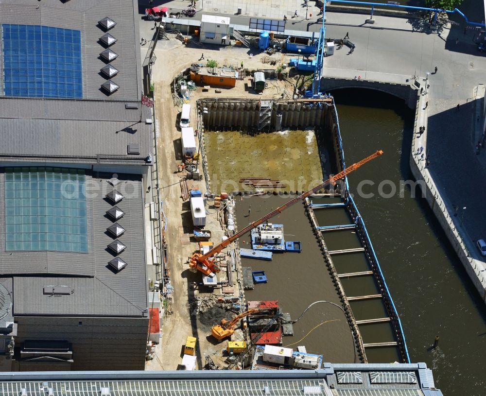 Berlin from above - Construction site at the riverside for a new entrance building to the Museum Island in Berlin