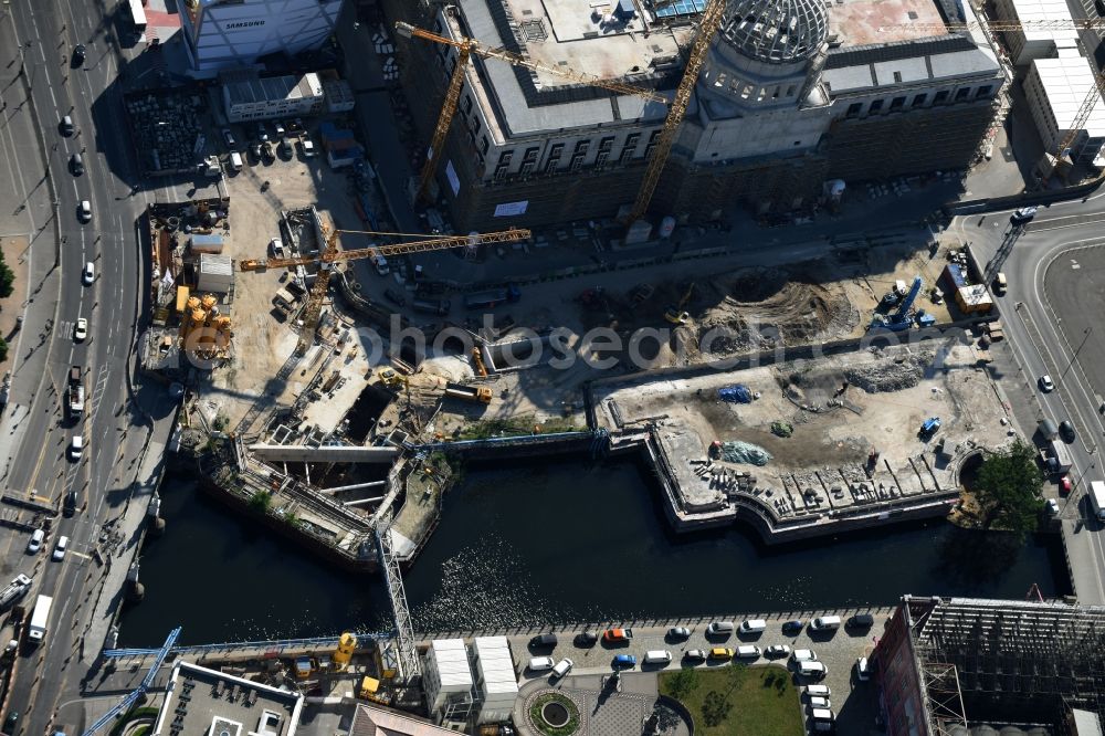 Berlin from above - Construction site on the shore of river Spree in front of the construction site of Berlin Palace in Berlin