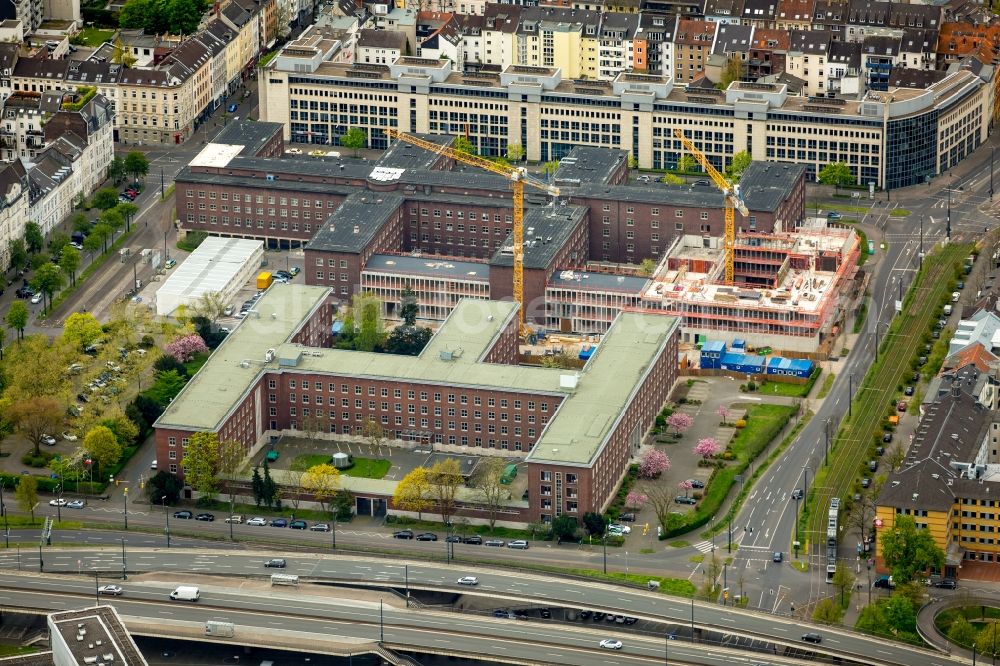 Aerial image Düsseldorf - Redevelopment works at the police department and ministry for Bauen und Wohnen on Hubertusstrasse in Duesseldorf in the state of North Rhine-Westphalia