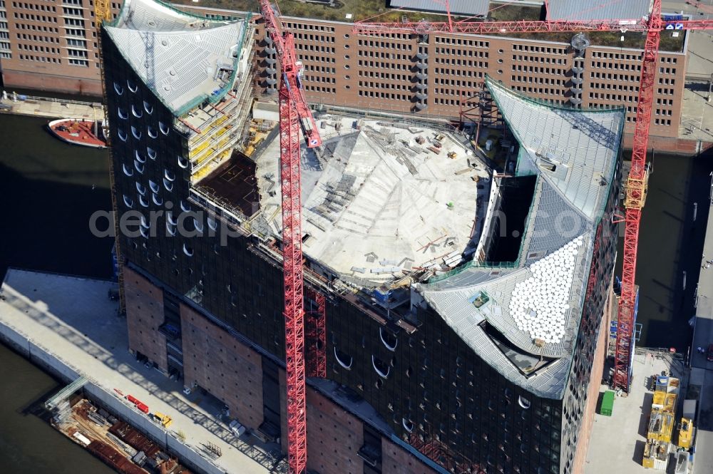 Hamburg from the bird's eye view: View the construction site of the Elbe Philharmonic Hall Hamburg. The Elbe Philharmonic Hall Hamburg ist built on the port city of Hamburg