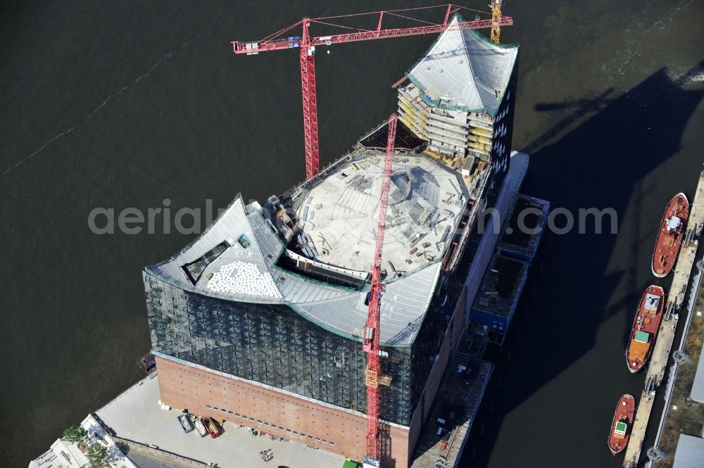 Hamburg from the bird's eye view: View the construction site of the Elbe Philharmonic Hall Hamburg. The Elbe Philharmonic Hall Hamburg ist built on the port city of Hamburg