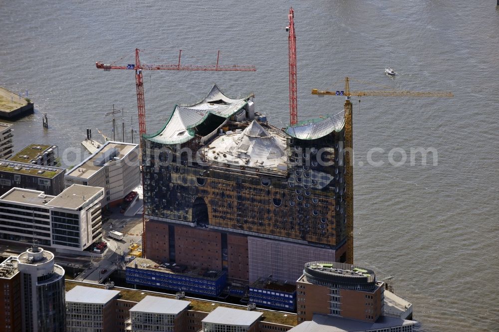 Hamburg from the bird's eye view: View the construction site of the Elbe Philharmonic Hall Hamburg. The Elbe Philharmonic Hall Hamburg ist built on the port city of Hamburg