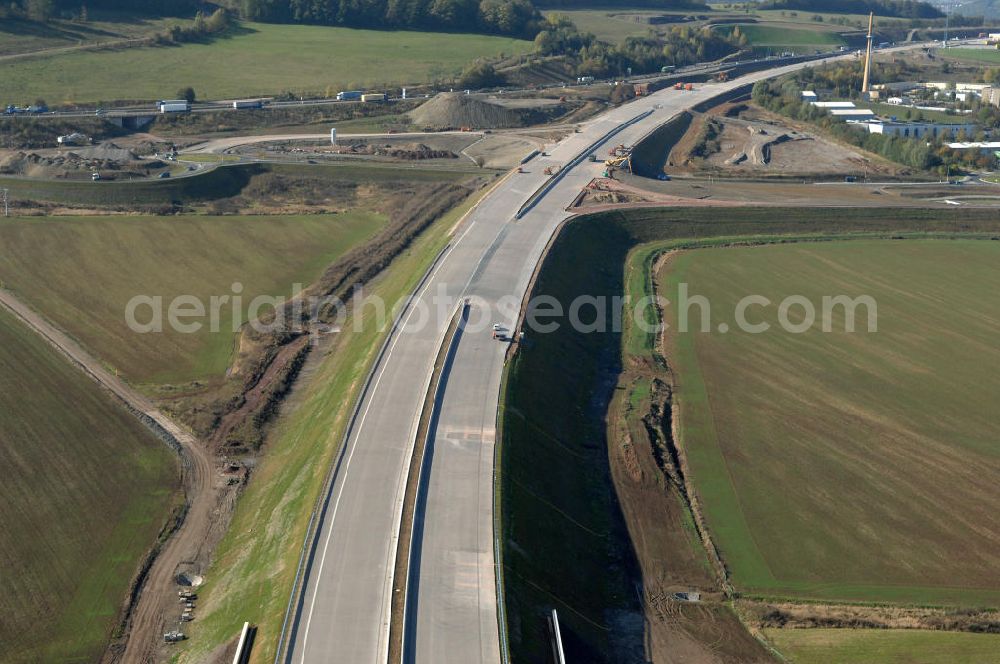 Aerial photograph Eisenach - Blick auf die Baustelle einer Unterführung der Ausfahrt / Anschlussstelle Eisenach-West der A4. Der Neubau ist Teil des Projekt Nordverlegung / Umfahrung Hörselberge der Autobahn E40 / A4 in Thüringen bei Eisenach. Durchgeführt werden die im Zuge dieses Projektes notwendigen Arbeiten unter an derem von den Mitarbeitern der Niederlassung Weimar der EUROVIA Verkehrsbau Union sowie der Niederlassungen Abbruch und Erdbau, Betonstraßenbau, Ingenieurbau und TECO Schallschutz der EUROVIA Beton sowie der DEGES.