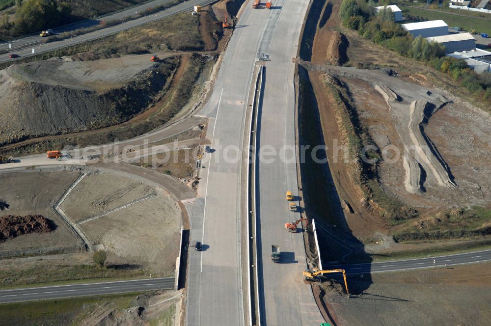 Eisenach from the bird's eye view: Blick auf die Baustelle einer Unterführung der Ausfahrt / Anschlussstelle Eisenach-West der A4. Der Neubau ist Teil des Projekt Nordverlegung / Umfahrung Hörselberge der Autobahn E40 / A4 in Thüringen bei Eisenach. Durchgeführt werden die im Zuge dieses Projektes notwendigen Arbeiten unter an derem von den Mitarbeitern der Niederlassung Weimar der EUROVIA Verkehrsbau Union sowie der Niederlassungen Abbruch und Erdbau, Betonstraßenbau, Ingenieurbau und TECO Schallschutz der EUROVIA Beton sowie der DEGES.