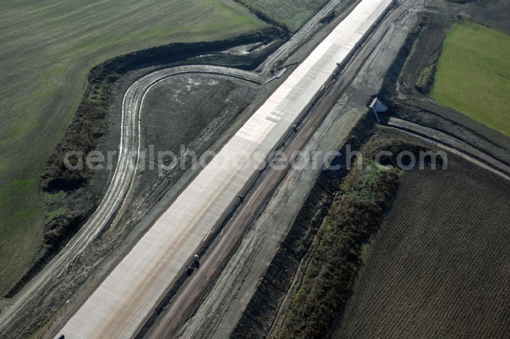 Aerial photograph Hastrungsfeld - Blick auf die Baustelle der A4 mit einer Unterführung bei Hastrungsfeld. Der Neubau ist Teil des Projekt Nordverlegung / Umfahrung Hörselberge der Autobahn E40 / A4 in Thüringen bei Eisenach. Durchgeführt werden die im Zuge dieses Projektes notwendigen Arbeiten unter an derem von den Mitarbeitern der Niederlassung Weimar der EUROVIA Verkehrsbau Union sowie der Niederlassungen Abbruch und Erdbau, Betonstraßenbau, Ingenieurbau und TECO Schallschutz der EUROVIA Beton sowie der DEGES.