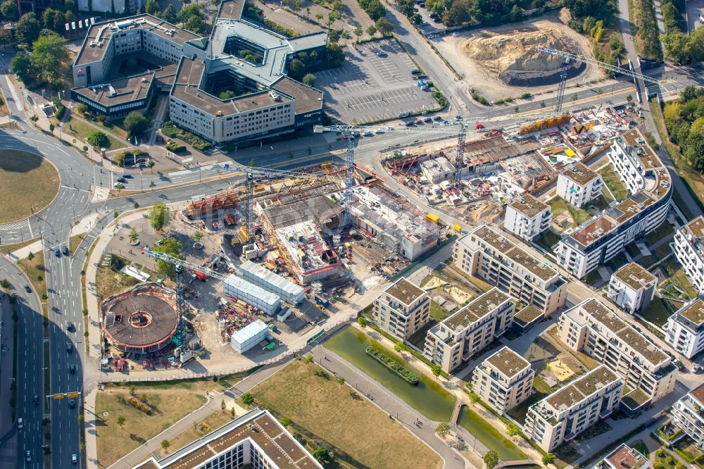 Essen from the bird's eye view: Construction site for the office building of Funke Media Group on Berliner Platz in Essen in the state of North Rhine-Westphalia. Executing construction company is Hochtief Aktiengesellschaft