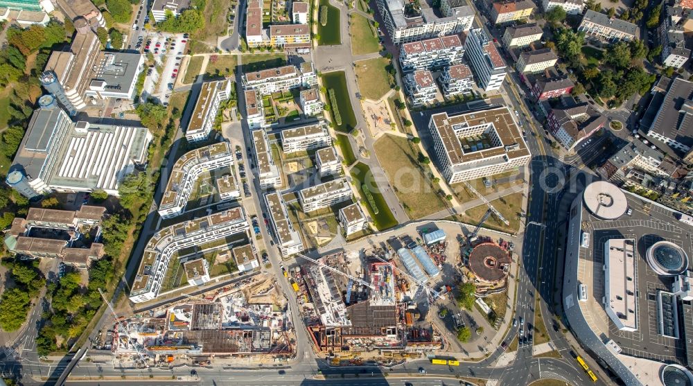 Essen from the bird's eye view: Construction site for the office building of Funke Media Group on Berliner Platz in Essen in the state of North Rhine-Westphalia. Executing construction company is Hochtief Aktiengesellschaft