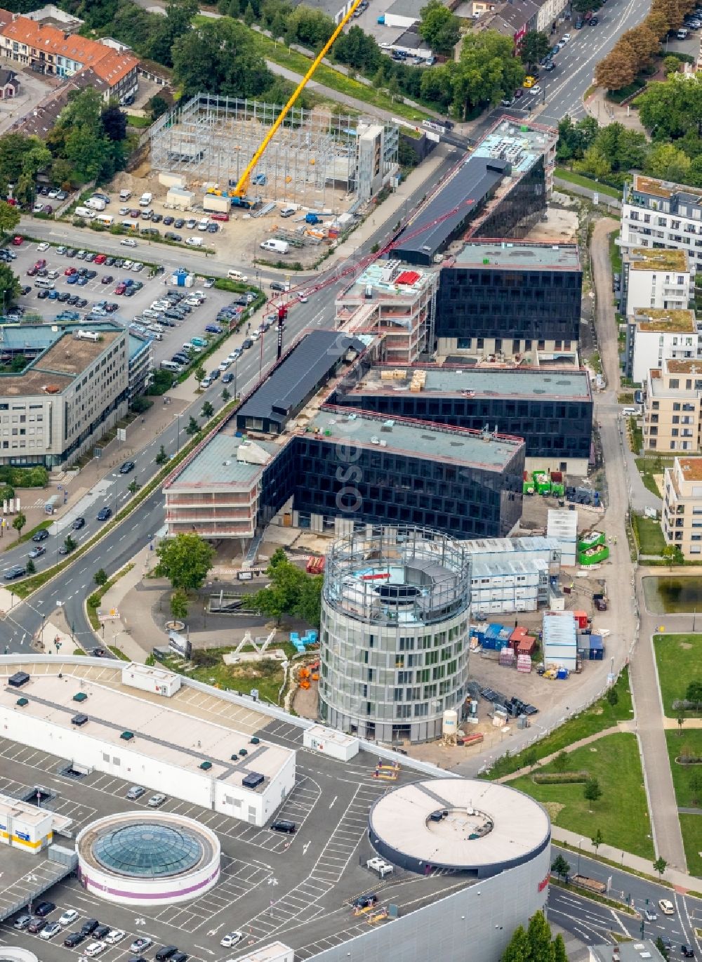 Essen from above - Construction site for the office building of Funke Media Group on Berliner Platz in Essen in the state of North Rhine-Westphalia. Executing construction company is Hochtief Aktiengesellschaft