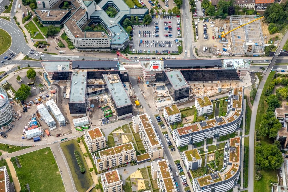 Aerial photograph Essen - Construction site for the office building of Funke Media Group on Berliner Platz in Essen in the state of North Rhine-Westphalia. Executing construction company is Hochtief Aktiengesellschaft